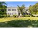 Charming traditional home featuring a well-manicured lawn and mature trees at 241 Wakefield Dr # C, Charlotte, NC 28209