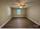 Bedroom with wood-look floors, natural light and neutral colors at 2703 34Th Street Ne Pl, Hickory, NC 28601