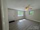 Bright bedroom with hard surface flooring, ceiling fan and natural light at 2703 34Th Street Ne Pl, Hickory, NC 28601