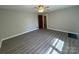 Bright bedroom with hard surface flooring, ceiling fan and natural light at 2703 34Th Street Ne Pl, Hickory, NC 28601