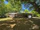 Charming brick home with attached garage and mature trees at 2703 34Th Street Ne Pl, Hickory, NC 28601