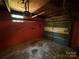 This garage has cement floors, a garage door, and painted walls at 2703 34Th Street Ne Pl, Hickory, NC 28601