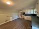 Kitchen featuring wood floors, sleek countertops, cabinets and modern appliances at 2703 34Th Street Ne Pl, Hickory, NC 28601