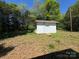View of exterior storage building with a white door and white walls at 2703 34Th Street Ne Pl, Hickory, NC 28601