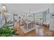 Inviting dining room features open access to the kitchen and hardwood floors at 3008 Gantt St, Salisbury, NC 28146