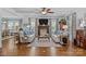 Bright living room featuring a decorative fireplace and hardwood floors at 3008 Gantt St, Salisbury, NC 28146