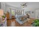 Spacious main bedroom with a large bed, rug, ceiling fan, natural light and decorative wall art at 3008 Gantt St, Salisbury, NC 28146