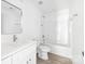 Bright bathroom featuring shower-tub combination, toilet, and vanity at 3048 Goble St, Gastonia, NC 28056
