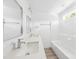 Bright bathroom featuring double sinks and a tub with window at 3048 Goble St, Gastonia, NC 28056