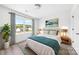 Inviting bedroom featuring a plush bed, bright windows, and stylish decor at 3048 Goble St, Gastonia, NC 28056