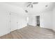Bright bedroom featuring ceiling fan, two closets, and a view to the bathroom at 3048 Goble St, Gastonia, NC 28056