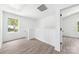 Bonus room with an attic access, a view to outside and neutral colored flooring at 3048 Goble St, Gastonia, NC 28056