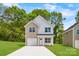 Well-maintained two-story home with a spacious front yard and private driveway at 3048 Goble St, Gastonia, NC 28056