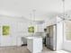 Bright kitchen features stainless appliances, white cabinets, an island, and natural light at 3048 Goble St, Gastonia, NC 28056
