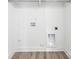 Bright laundry room featuring connections and modern neutral paint and flooring at 3048 Goble St, Gastonia, NC 28056