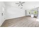 Bright, open living room boasts neutral walls, staircase, and seamlessly flows into the kitchen at 3048 Goble St, Gastonia, NC 28056