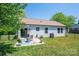 Inviting back patio with outdoor seating and colorful rug, perfect for relaxing outdoors at 3121 Suffolk Dr, Shelby, NC 28152