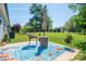 Large fenced backyard with a patio, outdoor seating, and lush green grass at 3121 Suffolk Dr, Shelby, NC 28152