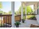 Covered front porch with white pillars at 3121 Suffolk Dr, Shelby, NC 28152