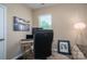 A home office with natural light, a modern desk, and an ergonomic chair at 3121 Suffolk Dr, Shelby, NC 28152