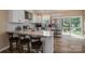 Bright kitchen features granite countertops, stainless steel appliances, and a breakfast bar with seating at 3121 Suffolk Dr, Shelby, NC 28152
