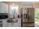 Bright kitchen features stainless steel appliances and a stainless steel sink at 3121 Suffolk Dr, Shelby, NC 28152