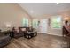 Cozy living room with a seamless flow leading to front entrance and stylish decor at 3121 Suffolk Dr, Shelby, NC 28152