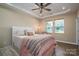 This main bedroom features trey ceilings, two windows, and a cozy seating area at 3121 Suffolk Dr, Shelby, NC 28152