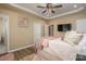 This main bedroom features trey ceilings, artwork, and a television at 3121 Suffolk Dr, Shelby, NC 28152