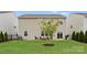 Well-manicured backyard with new patio furniture and lush green lawn at 3619 Slider Ter, Lancaster, SC 29720