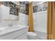 Stylish bathroom showcasing designer wallpaper, a modern vanity, and a luxurious shower at 3619 Slider Ter, Lancaster, SC 29720