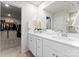 Bathroom with double vanity, large mirror, and walk in closet at 3619 Slider Ter, Lancaster, SC 29720