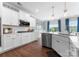 Bright, modern kitchen features stainless steel appliances, white cabinets, and a subway tile backsplash at 3619 Slider Ter, Lancaster, SC 29720
