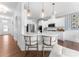 Spacious kitchen with stainless appliances, white cabinets and quartz countertops. Eat in bar with room for seating at 3619 Slider Ter, Lancaster, SC 29720