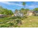 Spacious backyard featuring a well-maintained lawn and privacy fence, perfect for outdoor activities and entertaining at 402 Digh St, Gastonia, NC 28052