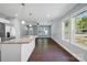 Bright, open kitchen flows into living area, featuring modern appliances and plenty of natural light at 402 Digh St, Gastonia, NC 28052