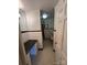 Bathroom with black and white tile and vintage pink fixtures at 404 S Mulberry St, Cherryville, NC 28021