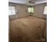 Bedroom featuring natural light with a ceiling fan at 404 S Mulberry St, Cherryville, NC 28021