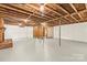 Large unfinished basement with exposed ceiling at 4110 Charles Raper Jonas Hwy, Alexis, NC 28006