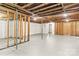 Unfinished basement featuring exposed ceiling beams and wooden framing, offering customization potential at 4110 Charles Raper Jonas Hwy, Alexis, NC 28006