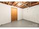 Unfinished basement with painted floors at 4110 Charles Raper Jonas Hwy, Alexis, NC 28006
