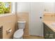 Cozy bathroom featuring tiled walls and a window at 4110 Charles Raper Jonas Hwy, Alexis, NC 28006
