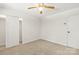 Bright bedroom with a ceiling fan, closet and neutral carpet at 4110 Charles Raper Jonas Hwy, Alexis, NC 28006
