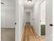 Hallway with wood floors at 4110 Charles Raper Jonas Hwy, Alexis, NC 28006