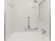 Clean, white tiled shower and bath at 4110 Charles Raper Jonas Hwy, Alexis, NC 28006