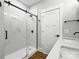 Bathroom showcasing a glass enclosed shower with marble-look tile and black fixtures at 424 Fulton Dr, Kings Mountain, NC 28086