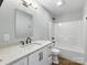 Contemporary bathroom with vanity, sleek white tiling, modern black fixtures, and a tub at 424 Fulton Dr, Kings Mountain, NC 28086