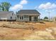 New home's exterior featuring modern siding, new roof, and front porch at 424 Fulton Dr, Kings Mountain, NC 28086