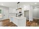 Bright kitchen featuring an island, modern cabinets, and stainless steel appliances at 424 Fulton Dr, Kings Mountain, NC 28086