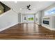 Bright living room with a modern ceiling fan, lots of natural light, and a cozy fireplace at 424 Fulton Dr, Kings Mountain, NC 28086